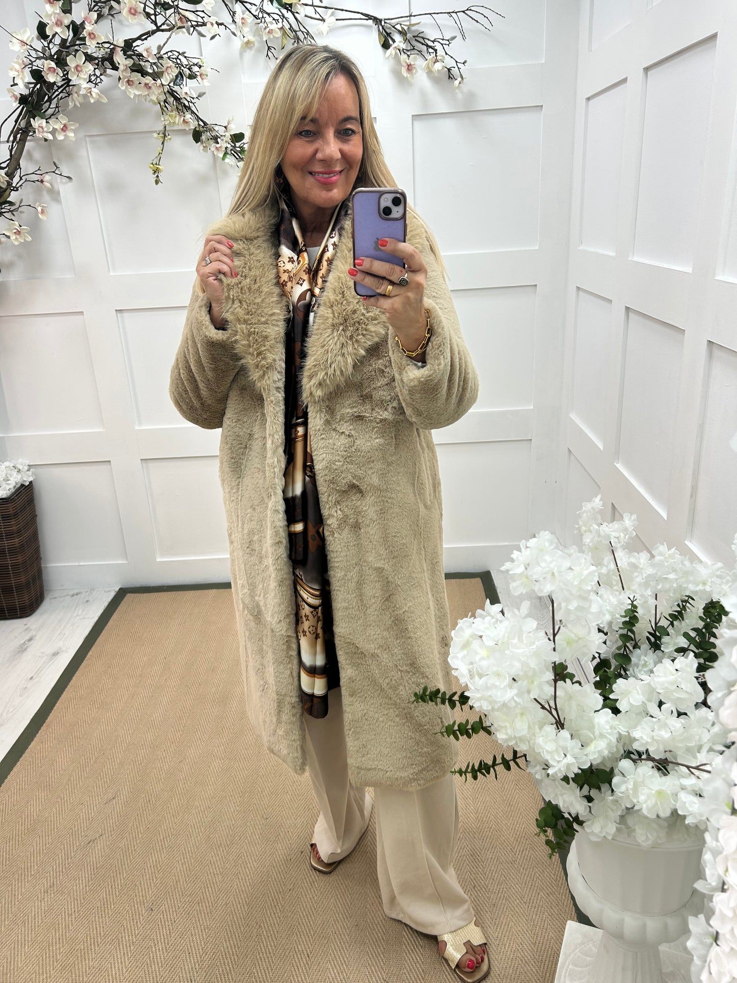 Madeleine: Beige long faux fur coat . One size 12-18