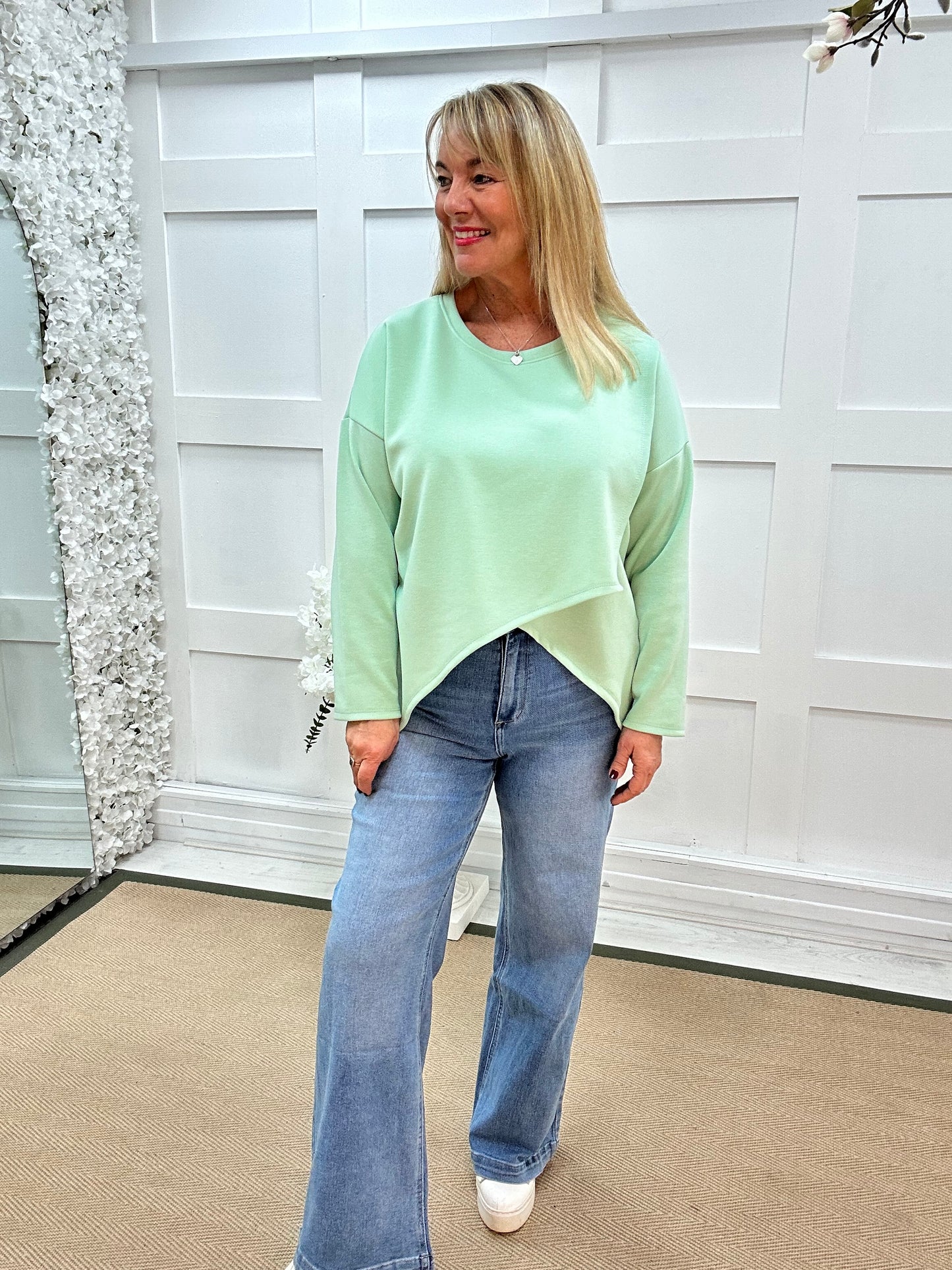 Phoebe: Mint over lay front oversized top . One size: 14-18
