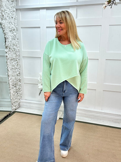 Phoebe: Mint over lay front oversized top . One size: 14-18