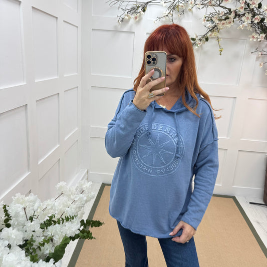 Sara: Blue hooded embossed compass top. One size: 12-18