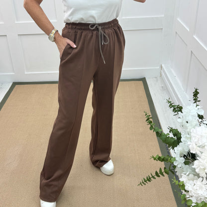 Trudy: Brown stretchy wide leg pocket trousers. 2 sizes