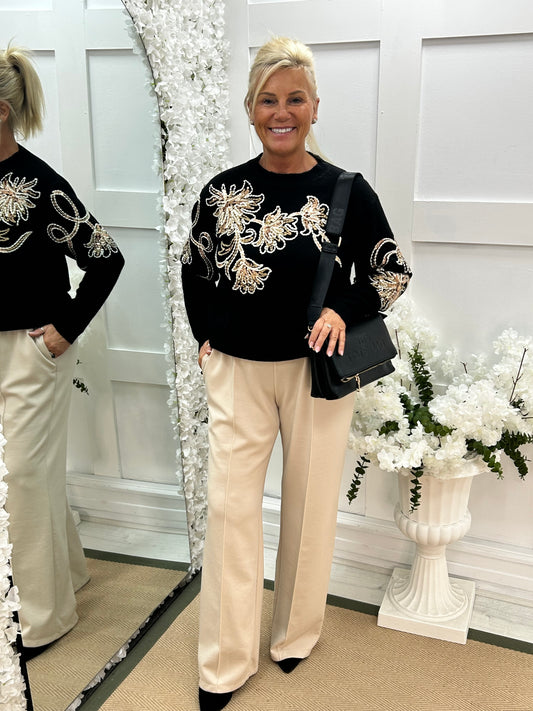 Honey: Black sequin floral knit top. One size: 10-16