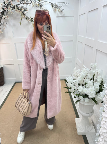Madeleine: Baby pink long faux fur coat . One size 12-18