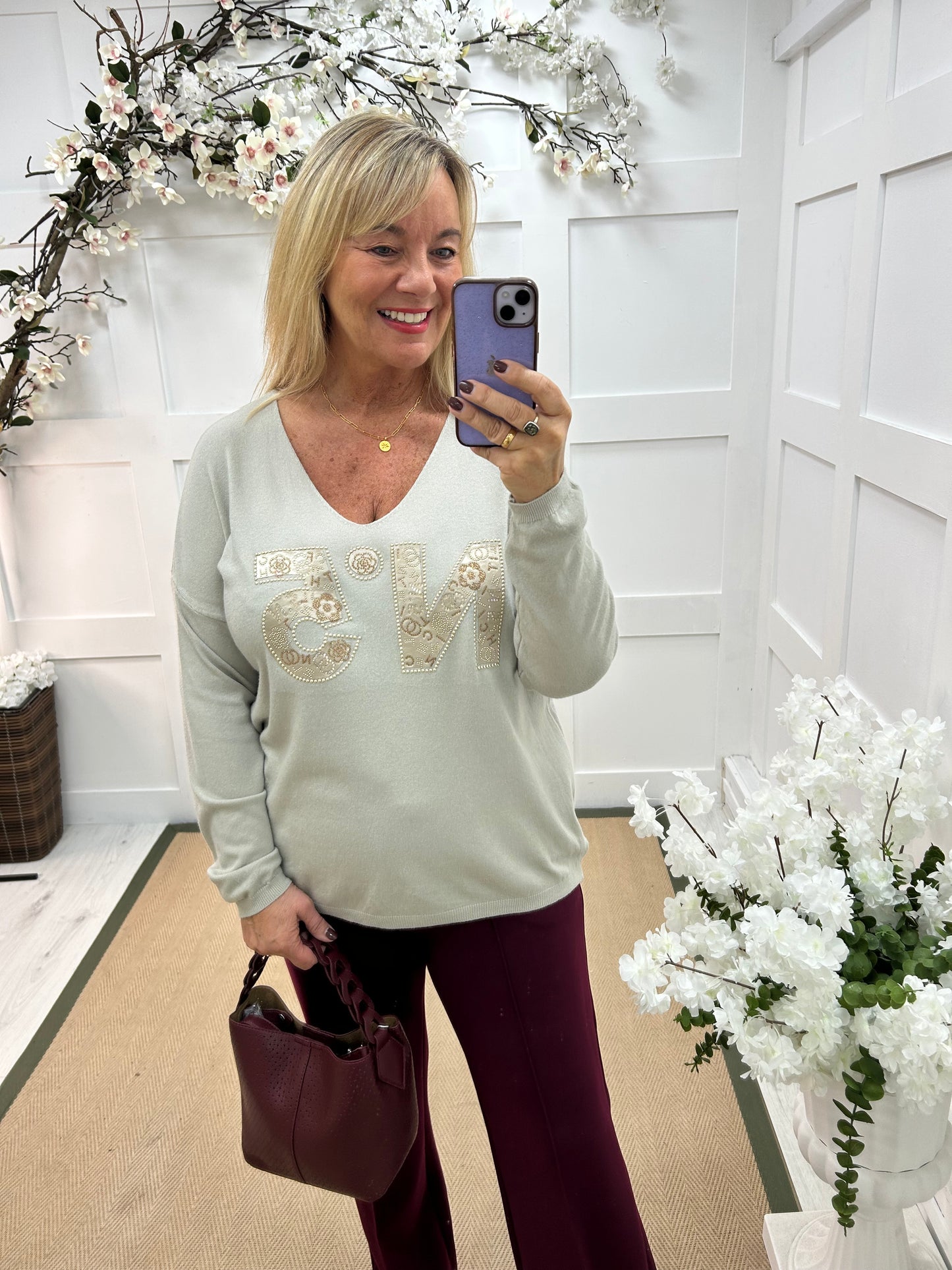 Cass: Stone V neck diamanté No5 knit top. One size: 14-20