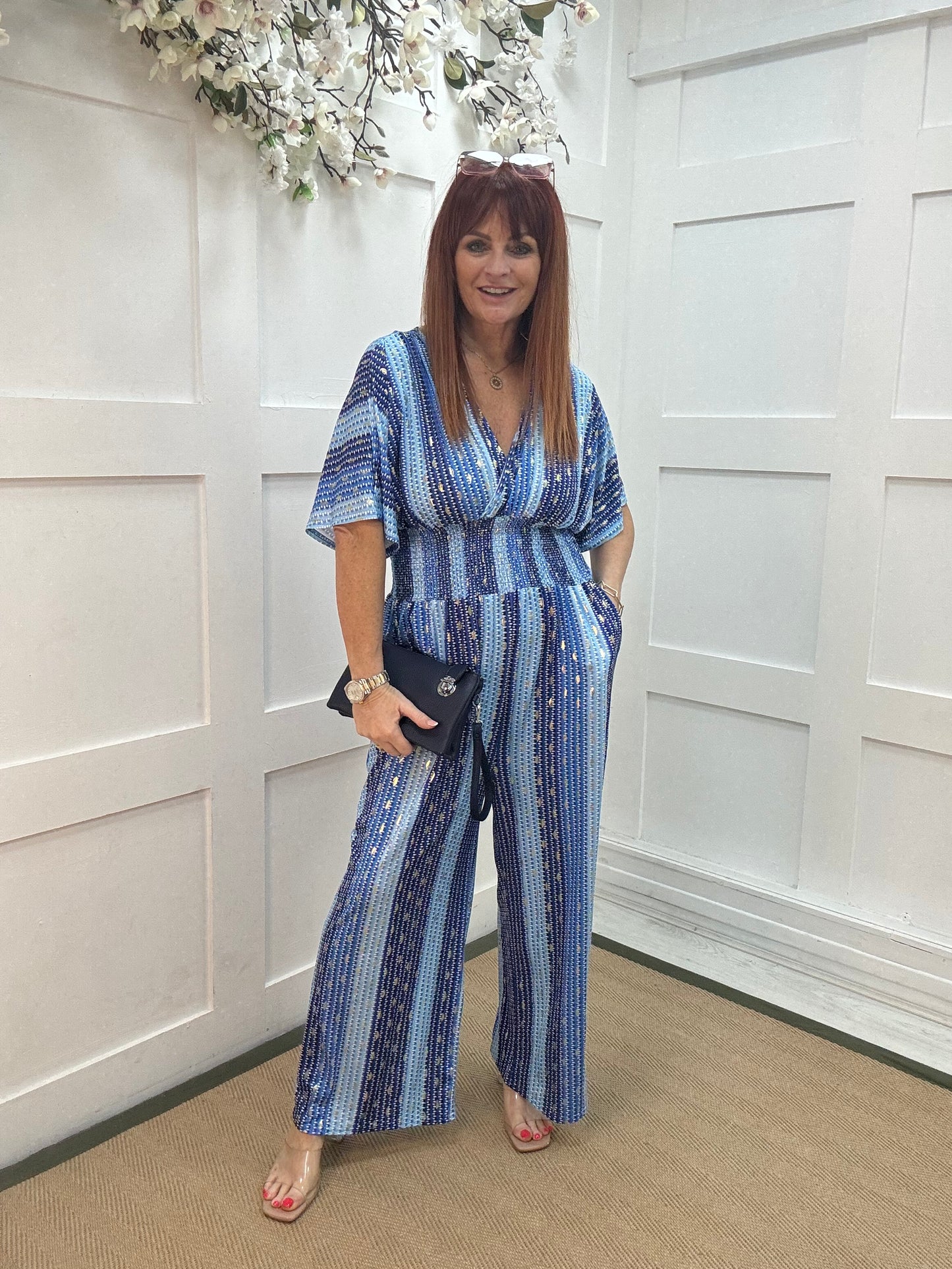 Gia: Blue and gold speckle wide leg jumpsuit. One size: 12-18