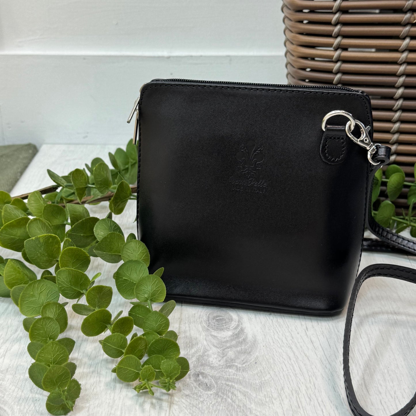 Thea: Black leather cross body/clutch bag.