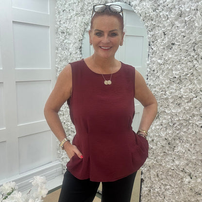 Maisie: Burgundy tie waist peplum top. One size: 14-18