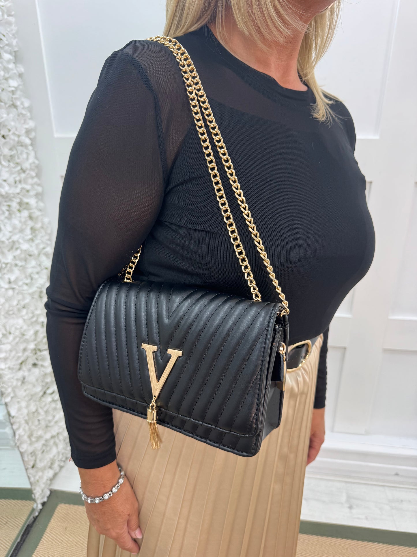 Clare: Black quilted gold V evening bag