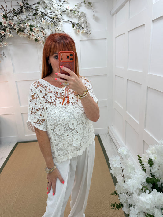 Karin: White crochet short sleeve top. One size: 12-18