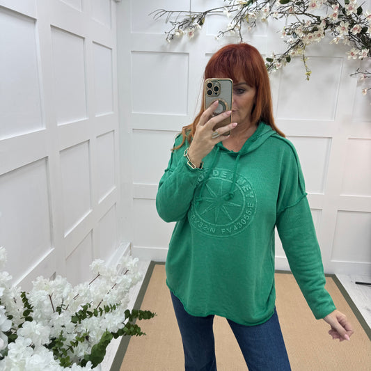 Sara: Emerald green hooded embossed compass top. One size: 12-18