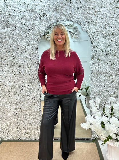 Arianne: Burgundy sparkle cutout shoulder top. One size: 12-16