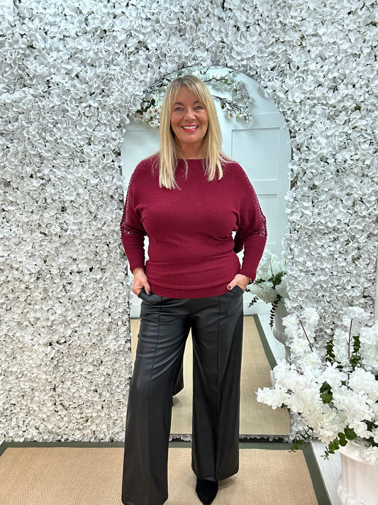 Arianne: Burgundy sparkle cutout shoulder top. One size: 12-16