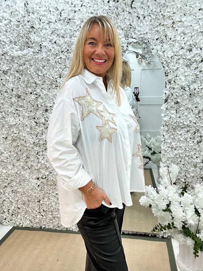 Stella: White sequin star shirt. One size: 16-20