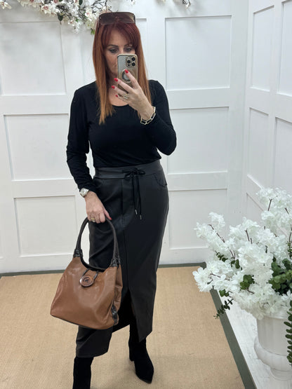 Pipa: Brown slouchy big button shoulder bag.