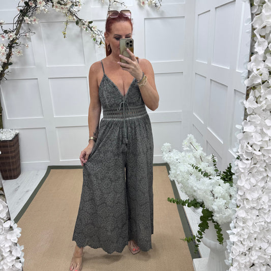 Bria: Grey broderie Anglaise strappy jumpsuit. One size: 10-14