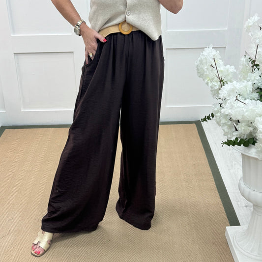 Tiggy: Brown wide leg belted trousers. One size: 10-16