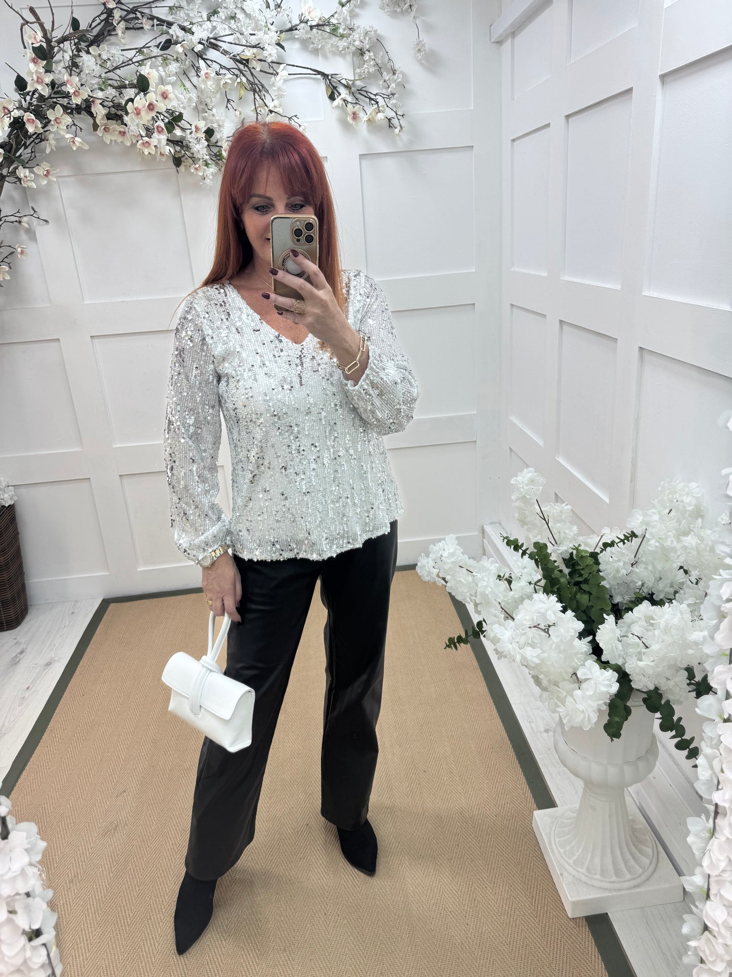 Sutton: White v-neck sequin top. One size: 12-16