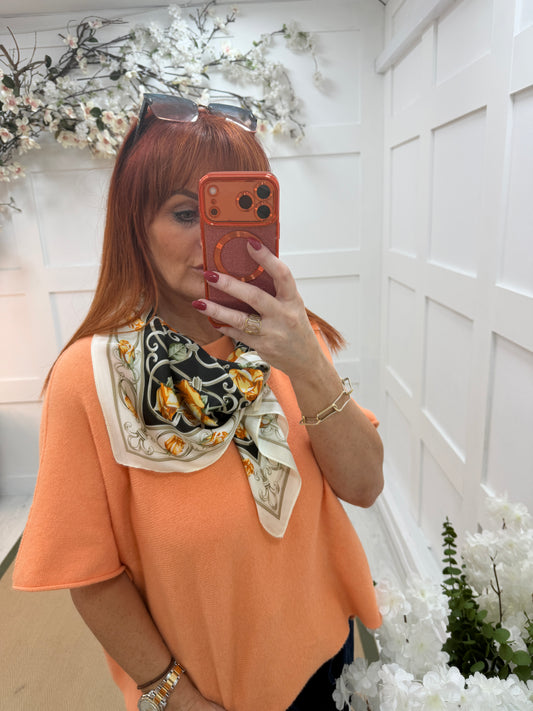 Rona: Black & orange rose  print silky neck scarf.