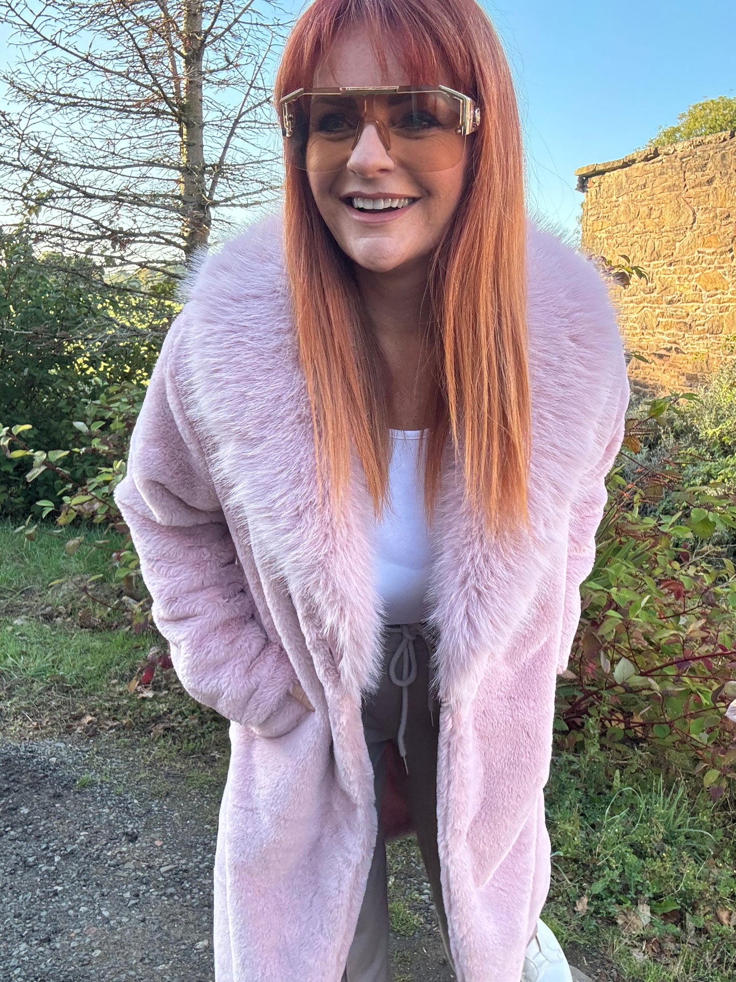 Madeleine: Baby pink long faux fur coat . One size 12-18