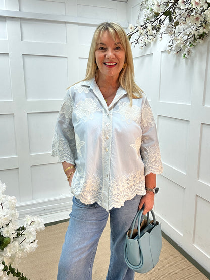 Emily: Blue floral embroidered shirt. One size: 14-20