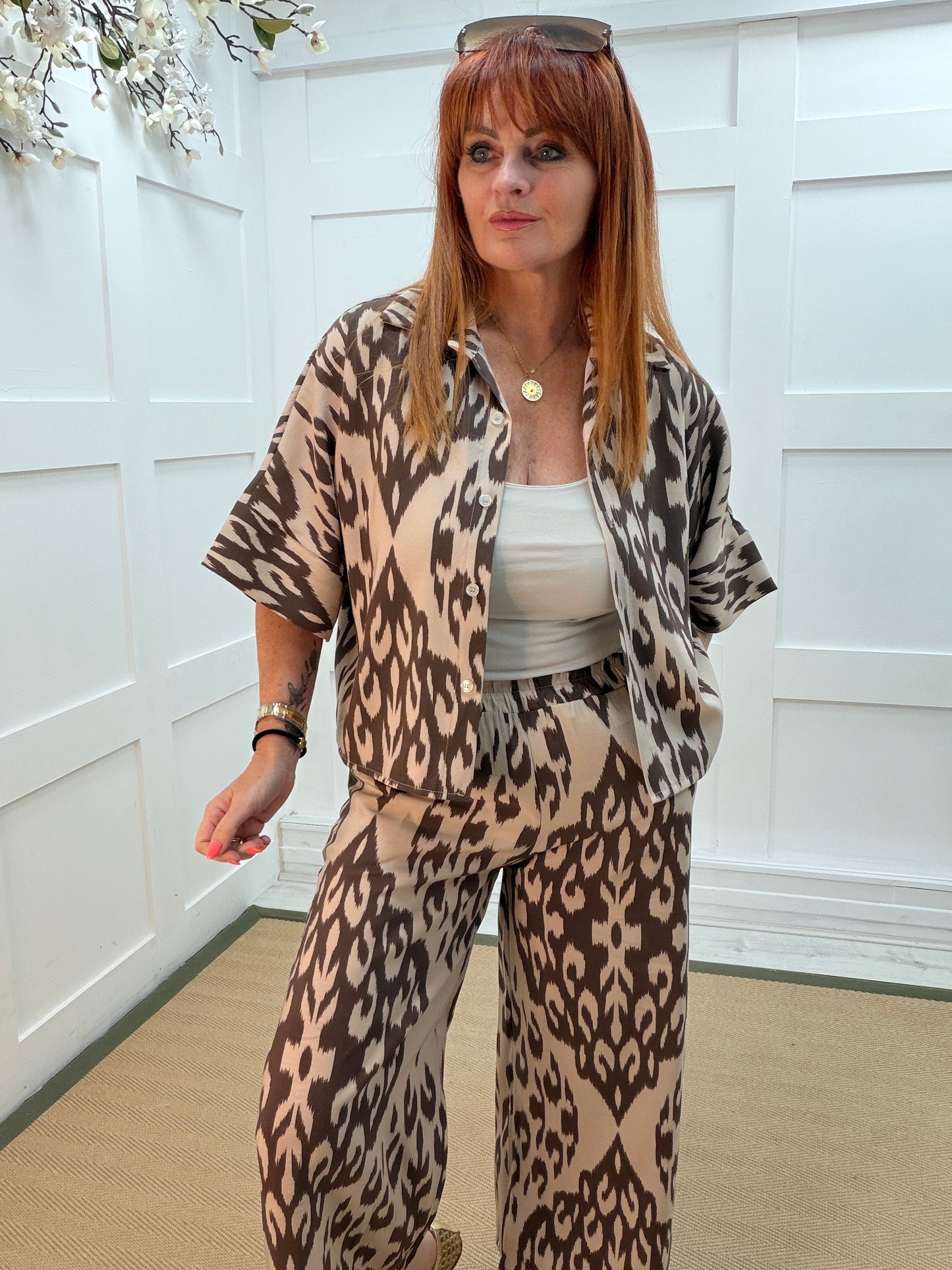 Sian: Brown & beige geometric printed shirt. One size: 12-16