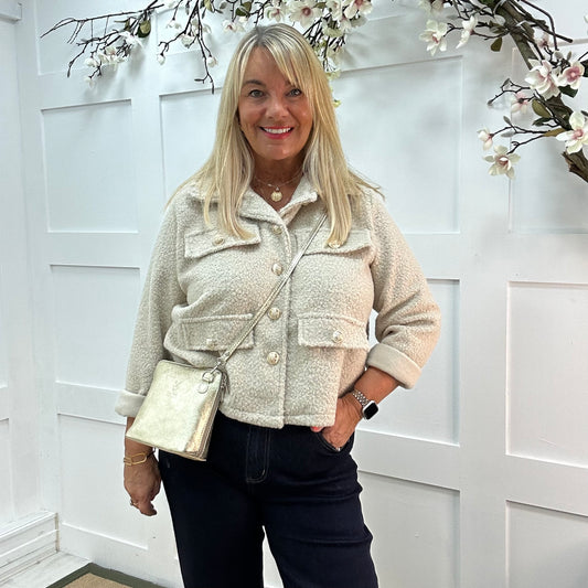 Bridget: Cream short boucle button jacket. One: 12-20