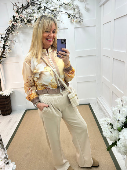 Steph: Gold pink floral printed bomber jacket. One size: 10-16