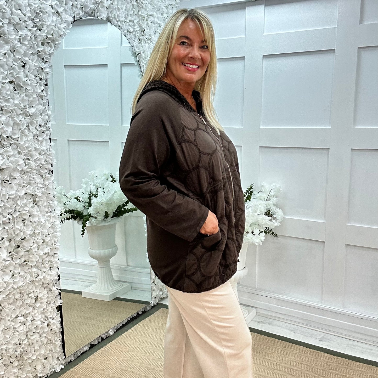 Malin: Brown quilted hooded jacket. One size: 12-20