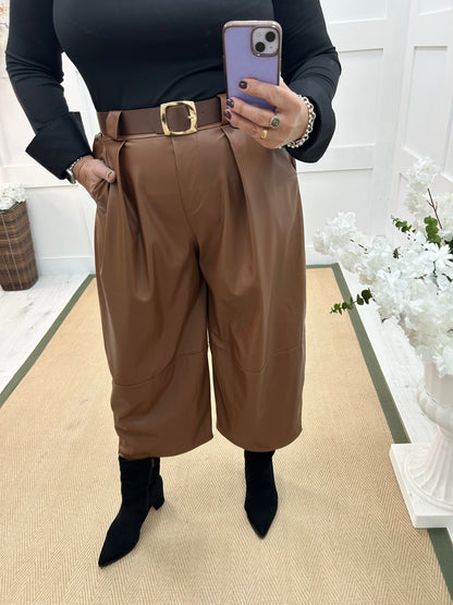 Allegra: Tan 3/4 faux leather belted trousers. One size: 14-18