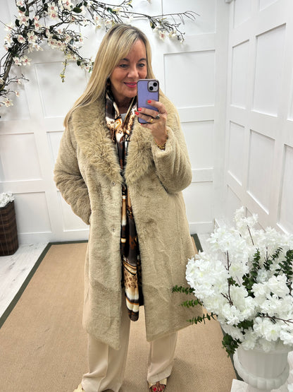 Madeleine: Beige long faux fur coat . One size 12-18