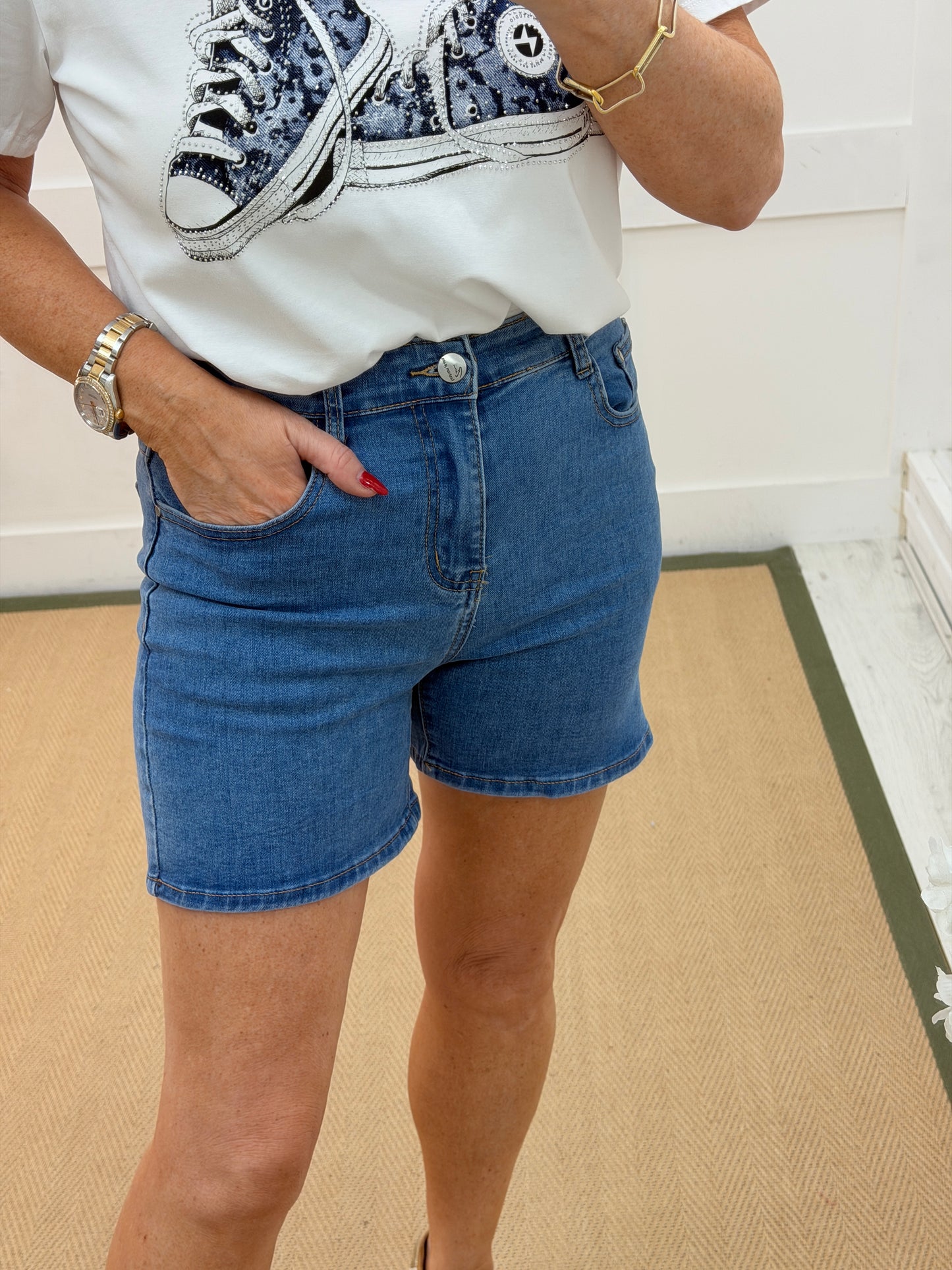 Daisy: Denim blue stretchy shorts. Sizes: 8-16
