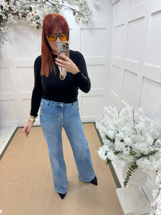 Manda: Light blue diamanté front pocket jeans. Sizes: 8-14