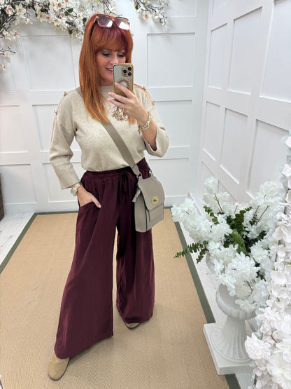 Lark: Burgundy needle cord wide trousers. One Size: 8-16