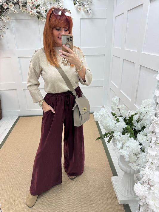 Lark: Burgundy needle cord wide trousers. One Size: 8-16