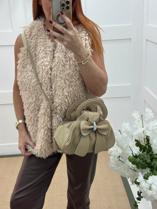 Trixi: Beige bow design cross body grab bag