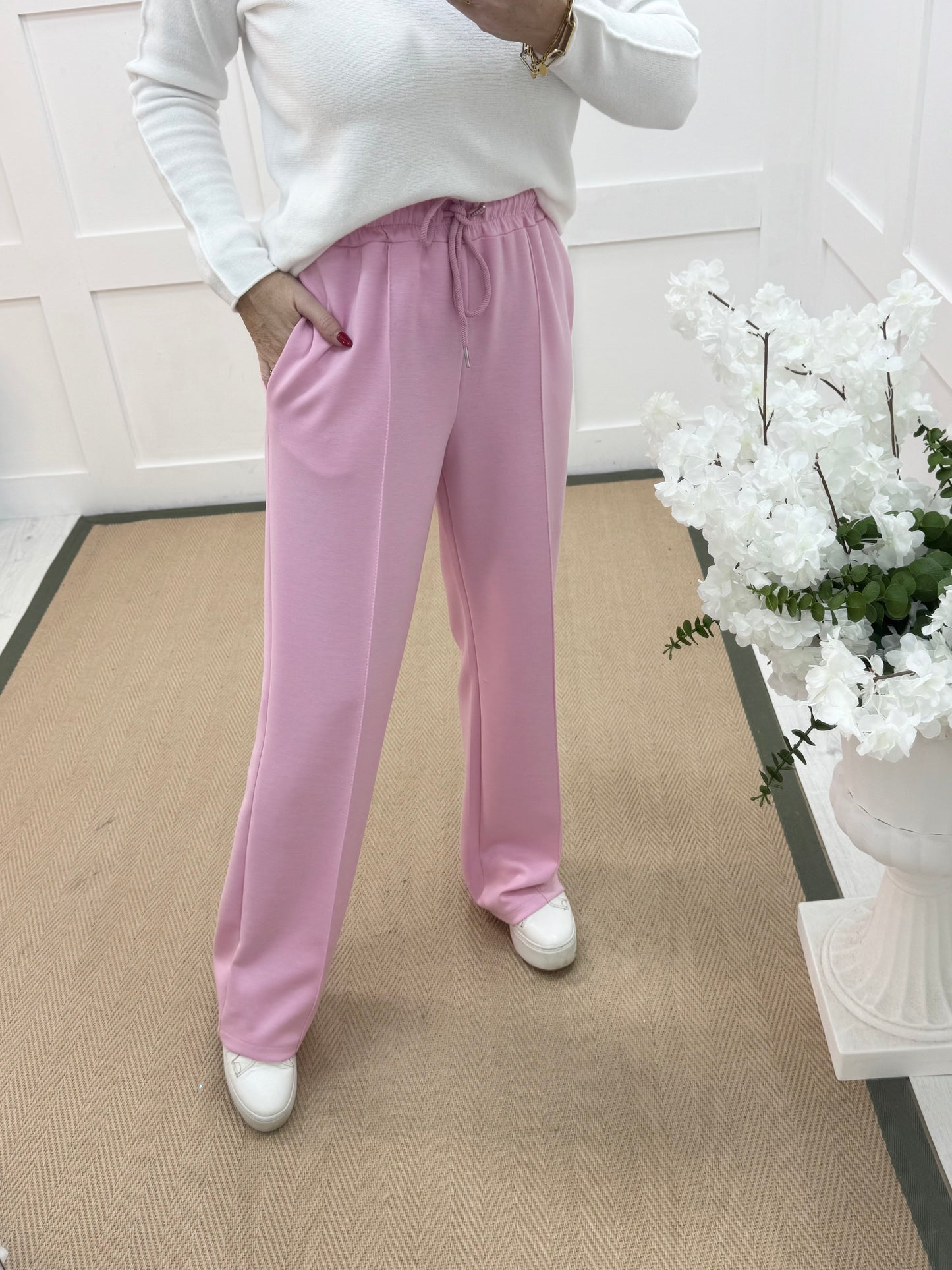 Trudy: Pink stretchy wide leg pocket trousers. 2 sizes