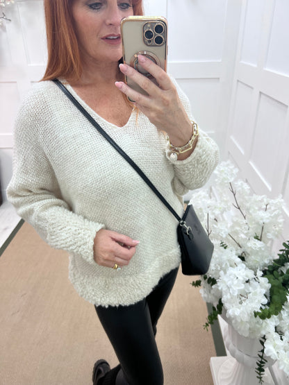 Fran: Cream wool V neck top. One size 12-18