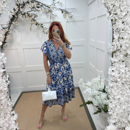 Emmy: Blue & white floral stretchy V neck midi dress. One size: 10-20