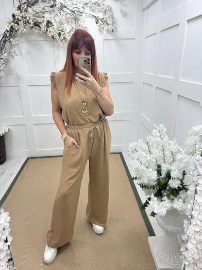Esme: Sand pocket wide leg trousers. One size: 12-20