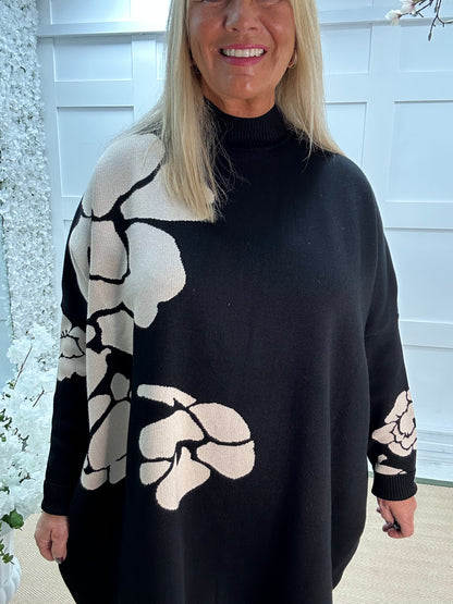 Esther: Black oversized longline knit top. One Sz: 16-24