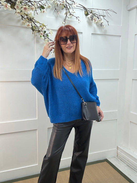 Alex: Blue V neck knitted top. One size 14-20