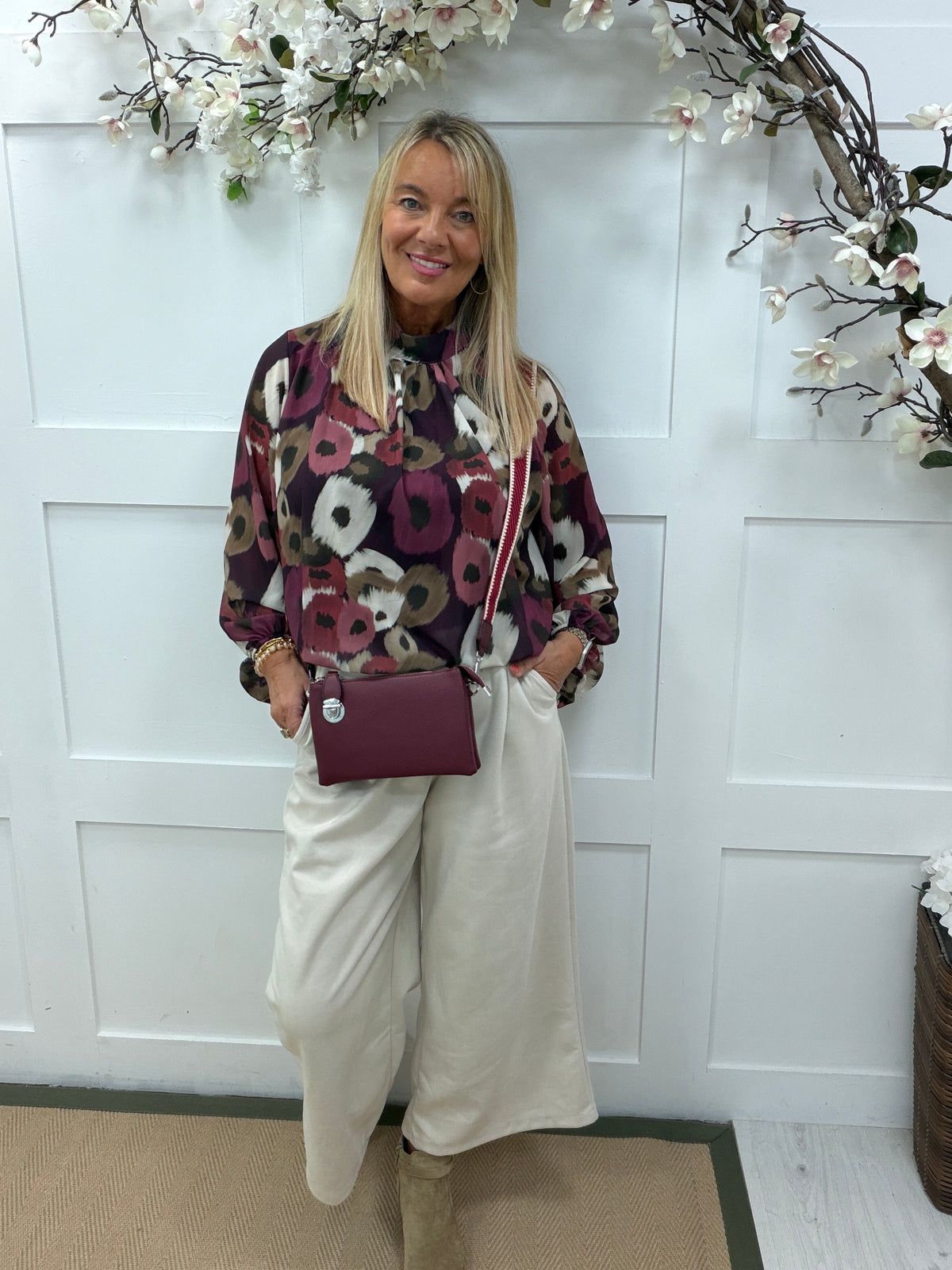 Perri: High neck printed blouse. One size: 12-18. 3 colours