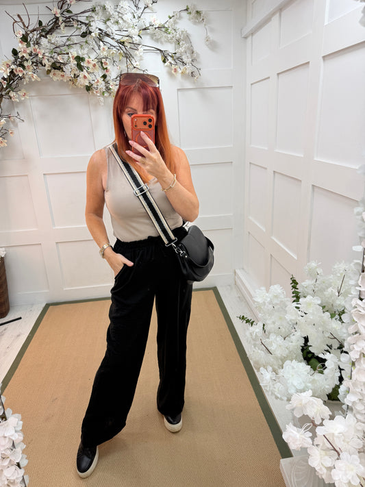 Leanne: Black wide leg trousers. One size: 10-14