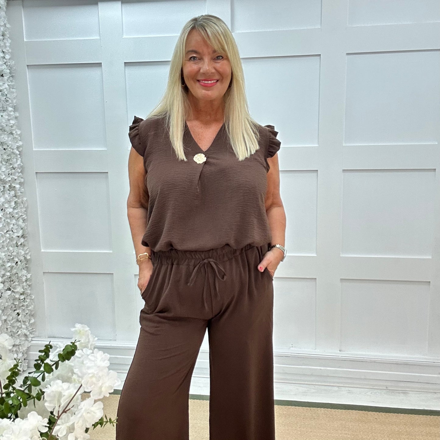 Drew: Brown V neck button top. One size: 14-20