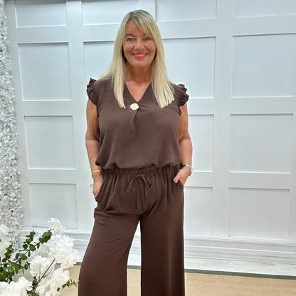 Drew: Brown V neck button top. One size: 14-20