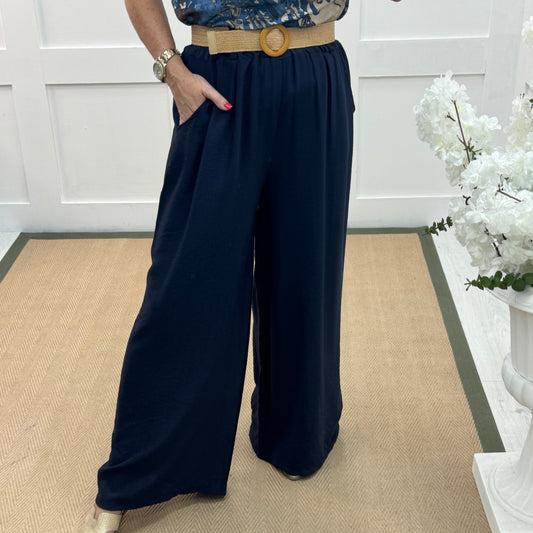Tiggy: Navy wide leg belted trousers. One size: 10-16