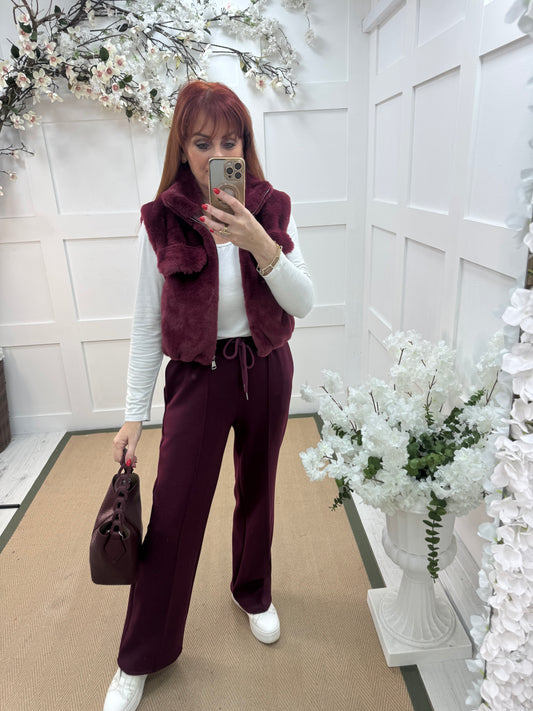 Effie: Burgundy teddy bear faux fur gilet. One size 8-14