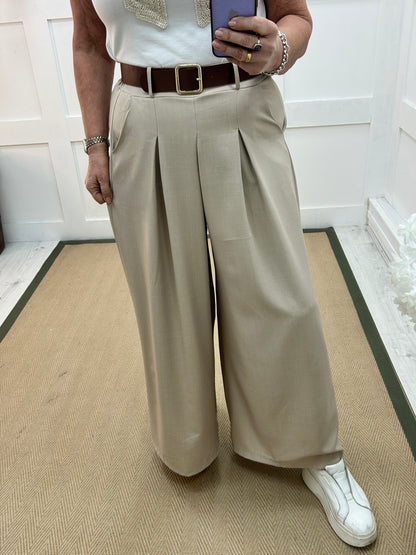 Zina: Beige pocket wide leg trousers. One size: 10-16