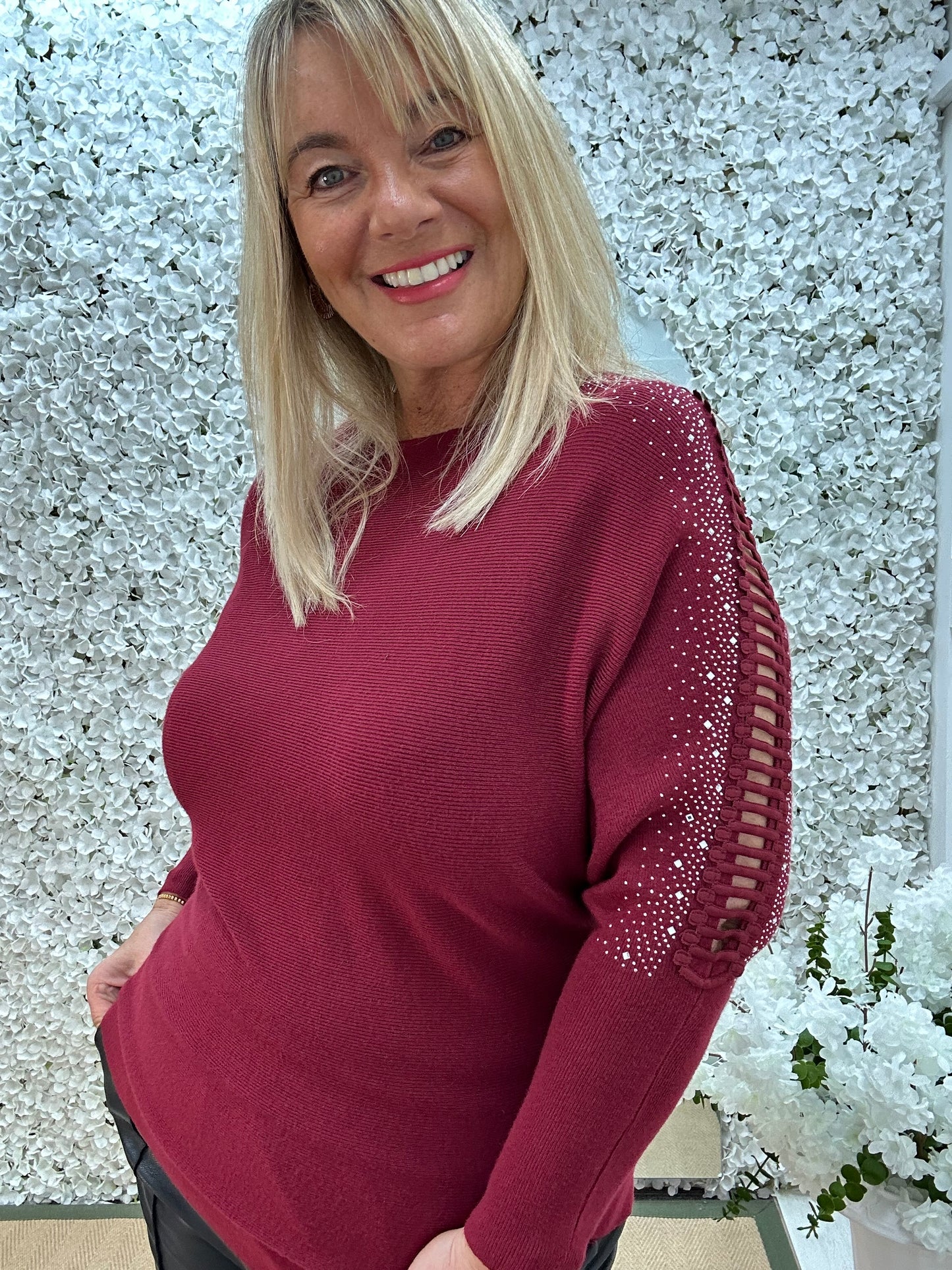 Arianne: Burgundy sparkle cutout shoulder top. One size: 12-16