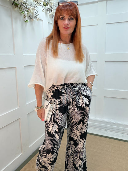 Fiona: Black & white floral print wide leg trousers. One size: 8-16